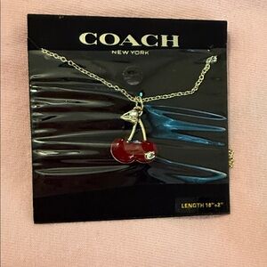 Coach Gold Necklace with Red Cherry Pendant